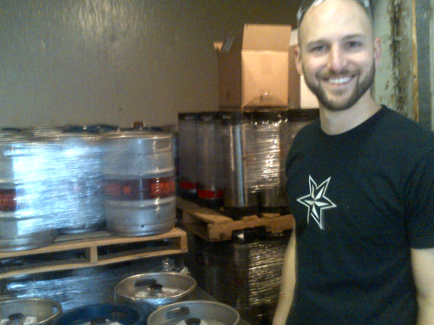 Sixpoint brewer Pete Dickson at Brewing Beer for Beasts 2013 event with fermentation vessels