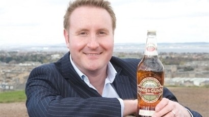 Dougal Sharp of Innis & Gunn holding a bottle, 2010