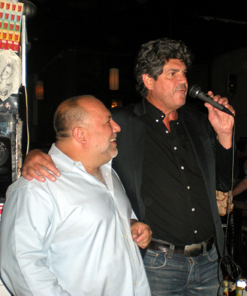 Ray Deter speaking at microphone with colleague at Beer Sessions Radio event, circa 2013