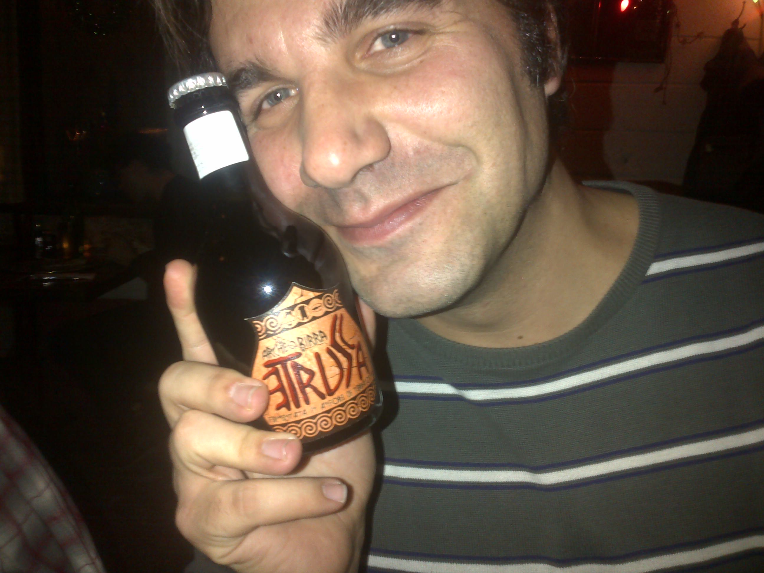 Leo DiVicecenzo from Birra Del Borgo holding a beer bottle, circa 2012