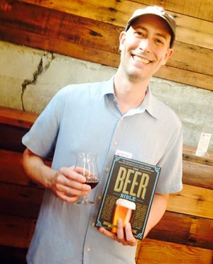Jeff Alworth holding The Beer Bible book, circa 2015